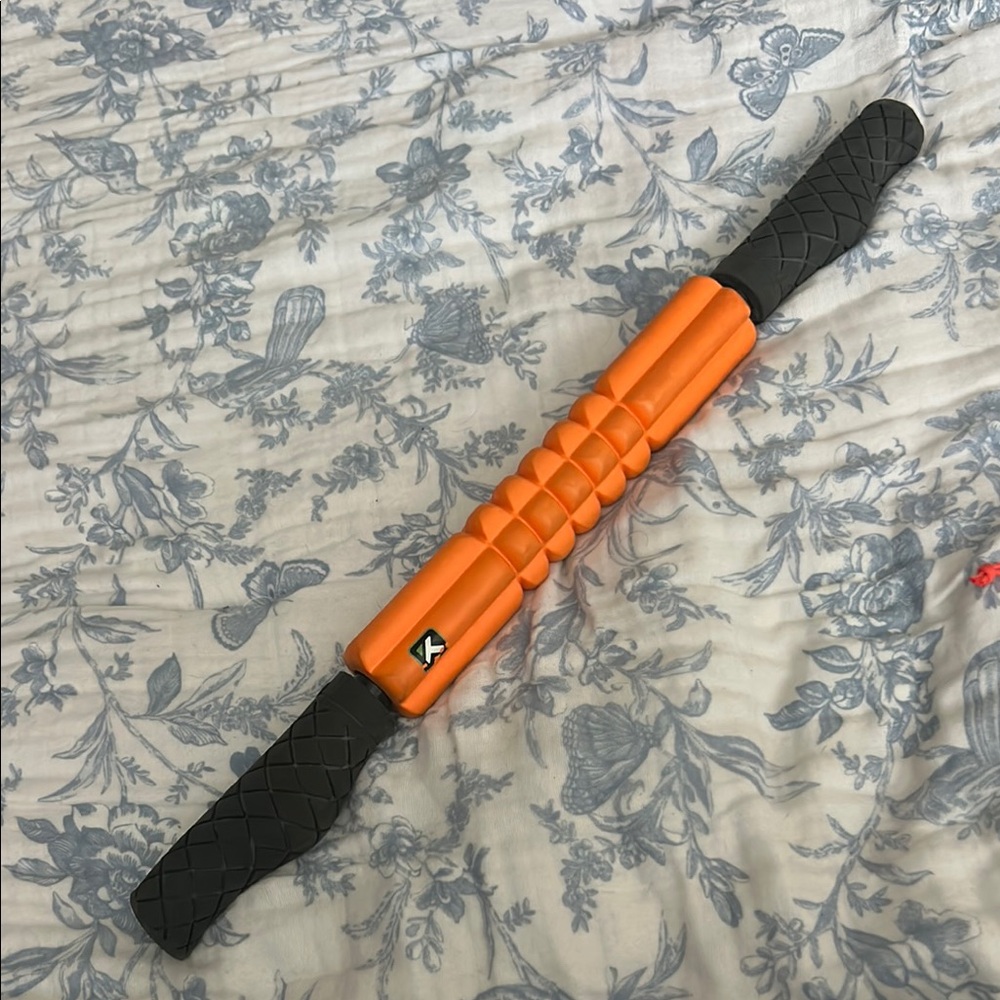 Orange and Black Muscle Roller Stick